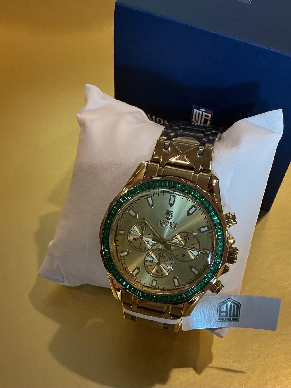 Invicta Gold Tone Watch with Green Bezel